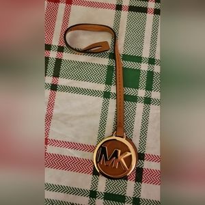 Michael Kors MK hanging bag embem